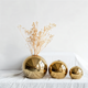 Gouden Bolvaas – Stijlvolle Keramische Woondecoratie