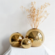 Gouden Bolvaas – Stijlvolle Keramische Woondecoratie